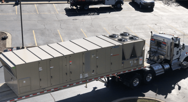 The second of two Daikin DPSA040 units arrives at the site.