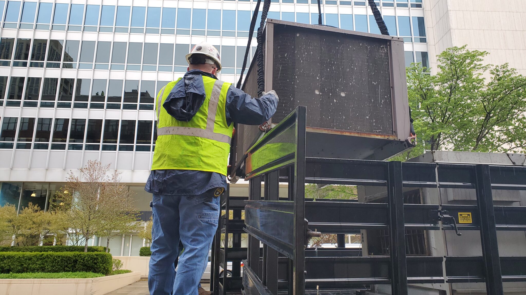 Loading it to be hauled away.