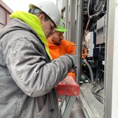 Omega Electricians disconnect the old units. Omega Electricians disconnect the old units.