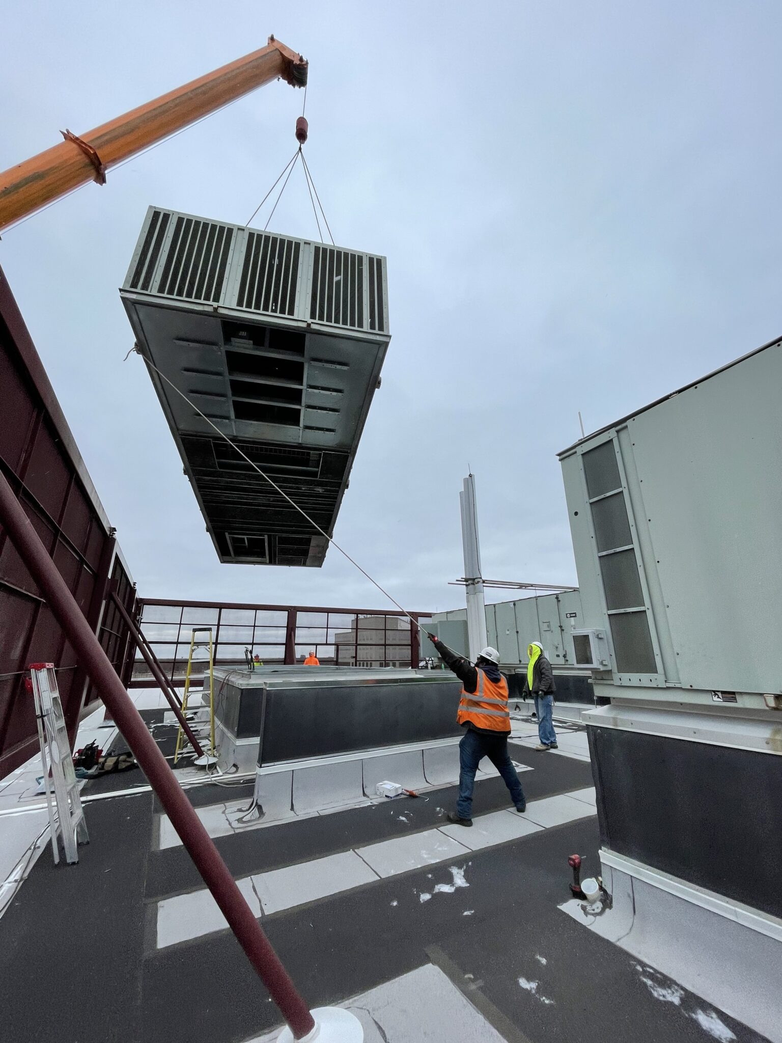 Guiding Unit Number 1 into place.