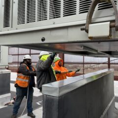 Slowly lowering Unit 1 into position.