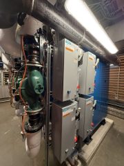 Chicago Commercial HVAC - Siemens Boiler Pump Controls A detailed view of Siemens electrical control panels and motor starters powering the inline water pumps for the newly installed Patterson-Kelley boilers at Lake Point Tower.