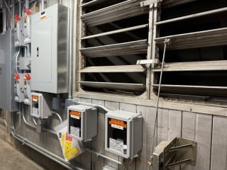 Chicago Commercial HVAC - Mechanical Room Control Panels A detailed view of the extensive electrical panels and building automation controls powering the newly installed commercial HVAC boiler system at Lake Point Tower in Chicago.