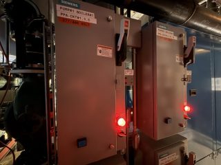 Chicago Commercial HVAC - Siemens Boiler Pump Controls A detailed view of Siemens electrical control panels and motor starters powering the inline water pumps for the newly installed Patterson-Kelley boilers at Lake Point Tower.