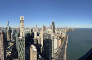 Downtown Chicago Skyline & Lakefront North Aerial Chicago lakefront architecture and downtown skyscrapers featuring Lake Shore Drive traffic and John Hancock building