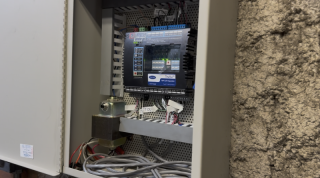 Lake Point Tower - Building Automation System Panel Commercial HVAC controls installation featuring a Building Automation System panel and wiring.