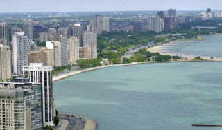 Chicago Lakefront High-Rise Infrastructure - Lake Shore Drive Aerial view of large-scale commercial and residential high-rise facilities along Lake Shore Drive and the Lake Michigan coastline in Chicago, Illinois.