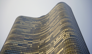 Lake Point Tower Glass Facade - Chicago High-Rise Facility Looking up at the distinctive curved glass exterior of Lake Point Tower in Chicago, illustrating the scale of large commercial and residential high-rise facilities.