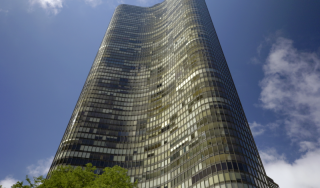 Lake Point Tower - Chicago Commercial and Residential High-Rise Building Low-angle exterior view of the curved glass facade of Lake Point Tower, a prominent commercial and residential high-rise building in downtown Chicago, Illinois.